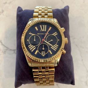 Gold Michael Kors watch with navy face